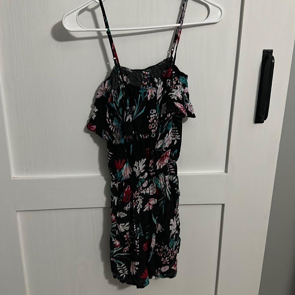 Spaghetti strap floral black romper.